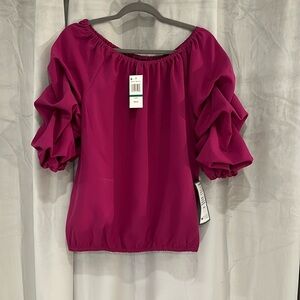 Magenta off the shoulder puff sleeve shirt.  Size large.  New with tags